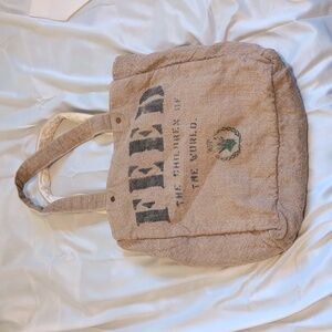 Feed the children of the world stone reversible tote